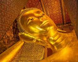 The statue is a symbol of Nirvana of the Lord Buddha means passing of Buddha.